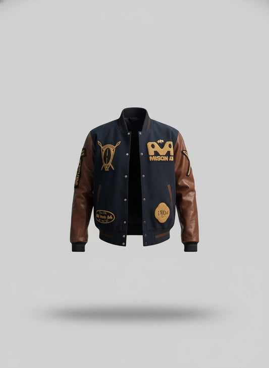 Le Teddy de l'Unité : Plus qu'une veste, c'est le symbole de notre famille. Le Teddy "Univers AA" est la seule pièce qui réunit les trois emblèmes de la marque : African Armure, Maison AA et Young Nation by AA.